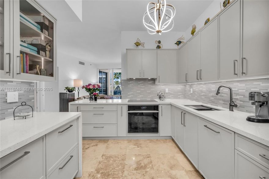 407 is the only unit on its floor, offering exceptional privacy . Just 11 miles from MIA with easy access in & out of the neighborhood, it appeals to buyers who value discretion, ease, and how a home lives. Well suited for full- or part-time residents, pied-à-terre buyers, or professionals who prioritize function over height or horizon. The light-filled interior features a new renovated full-size kitchen, high ceilings, & an oversized primary suite with 3 walk-in closets & bath with separate shower, water closet, & tub. The expansive terrace lives as a calm extension of the interior, framed by swaying palms and softened by the gentle soundscape of the building’s water feature. Positioned a few floors above the circular drive and valet arrival, activity is generally low, views re wide,  creating a surprisingly tranquil outdoor experience.
 Murano Grande features a restaurant for residents only, tennis courts, gym, spa,  pool over marina ,downtown views, & walkable lifestyle.