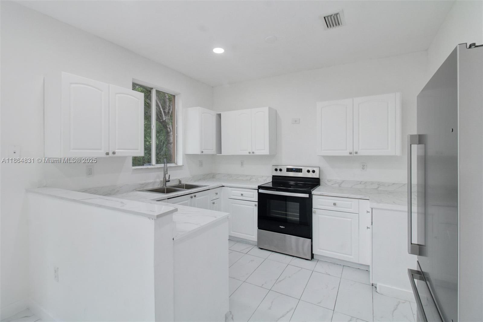 Welcome to Keys Cove, a gated community in Homestead! This spacious 3-bedroom, 2.5-bathroom townhouse features updated flooring throughout, outdoor patio space, a bright open layout, and a primary suite with a walk-in closet. Enjoy 2 assigned parking spaces for added convenience. The community offers a pool, clubhouse, and 24/7 security for peace of mind. Ideally located just minutes from Homestead Pavilion with shopping, dining, and entertainment options, plus easy access to the Florida Turnpike for a smooth commute to Miami and the Florida Keys. Experience comfortable living with modern updates in a well-maintained community.