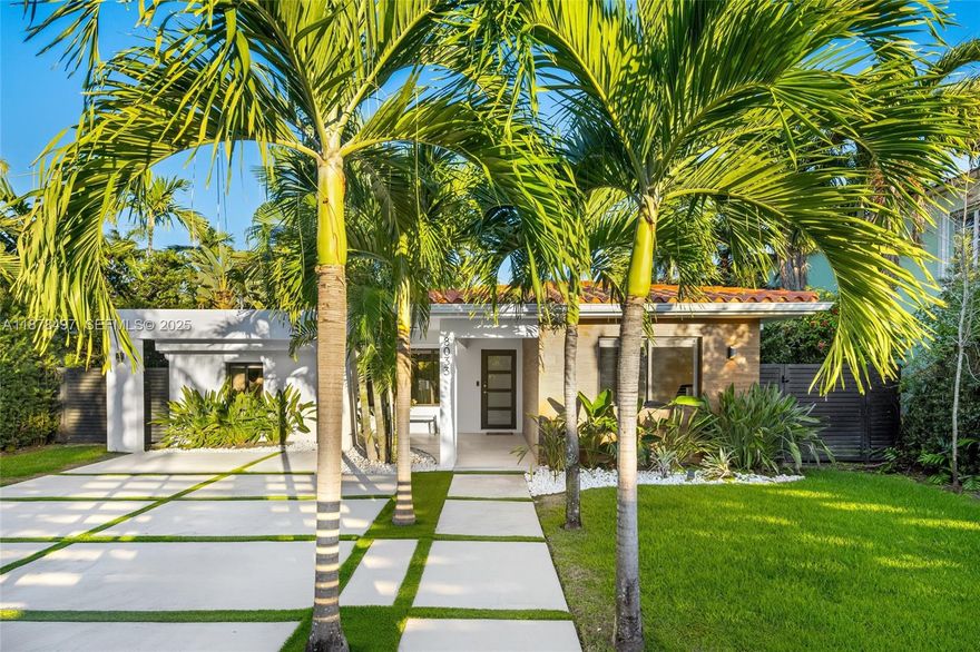 Behind the gates of Biscayne Point, this fully renovated waterfront residence completed in 2022 delivers 60 feet on the bay with no fixed bridges, direct ocean access, a brand-new seawall, and an expansive dock. Inside, nearly 2,500 sq ft under A/C soars with 11-ft ceilings, porcelain floors, impact glass, custom Italian doors & closets, and a chef’s Italian kitchen with Viking appliances. The 4-bed, 4-bath layout includes two new A/C units, electric shades, a motorized gate, and a Sonos system. The primary suite rises to 12-ft ceilings with a designer walk-in closet and a marble spa bath. Outdoors, 10-ft privacy hedges frame a resort-style oasis with summer kitchen, new pool & spa—your private Miami Beach retreat under $5M. Contact listing agents for more information.