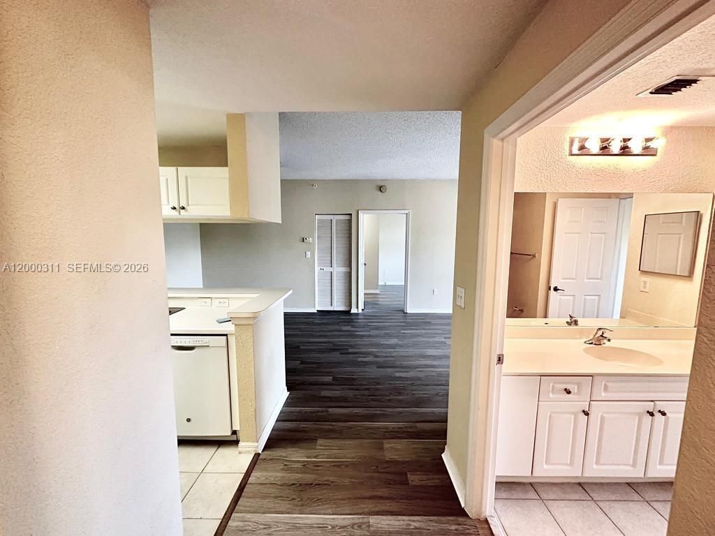 Photo of 2812 Grande Pkwy #302, Palm Beach Gardens, FL 33410 (MLS # A12000311)