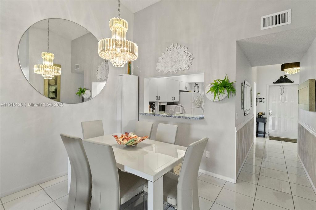 Photo of 7831 Willow Spring Dr #525, Lake Worth, FL 33467 (MLS # A11916126)