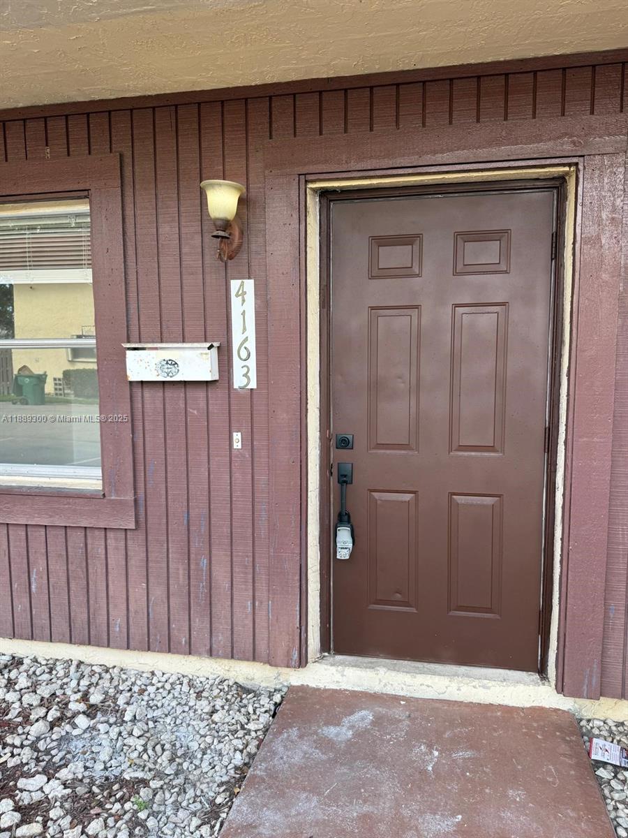 Remodeled 2 story townhome with fenced backyard. Washer and dryer inside the unit. Wood floors throughout. New kitchen with stainless steel appliances. Nice area. Close to Florida Turnpike, I-595, 441 and FLL Airport. Easy to show!!
