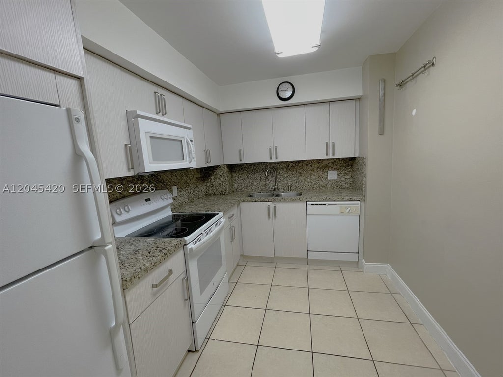 Photo of 3900 N Hills Dr #108, Hollywood, FL 33021 (MLS # A12045420)