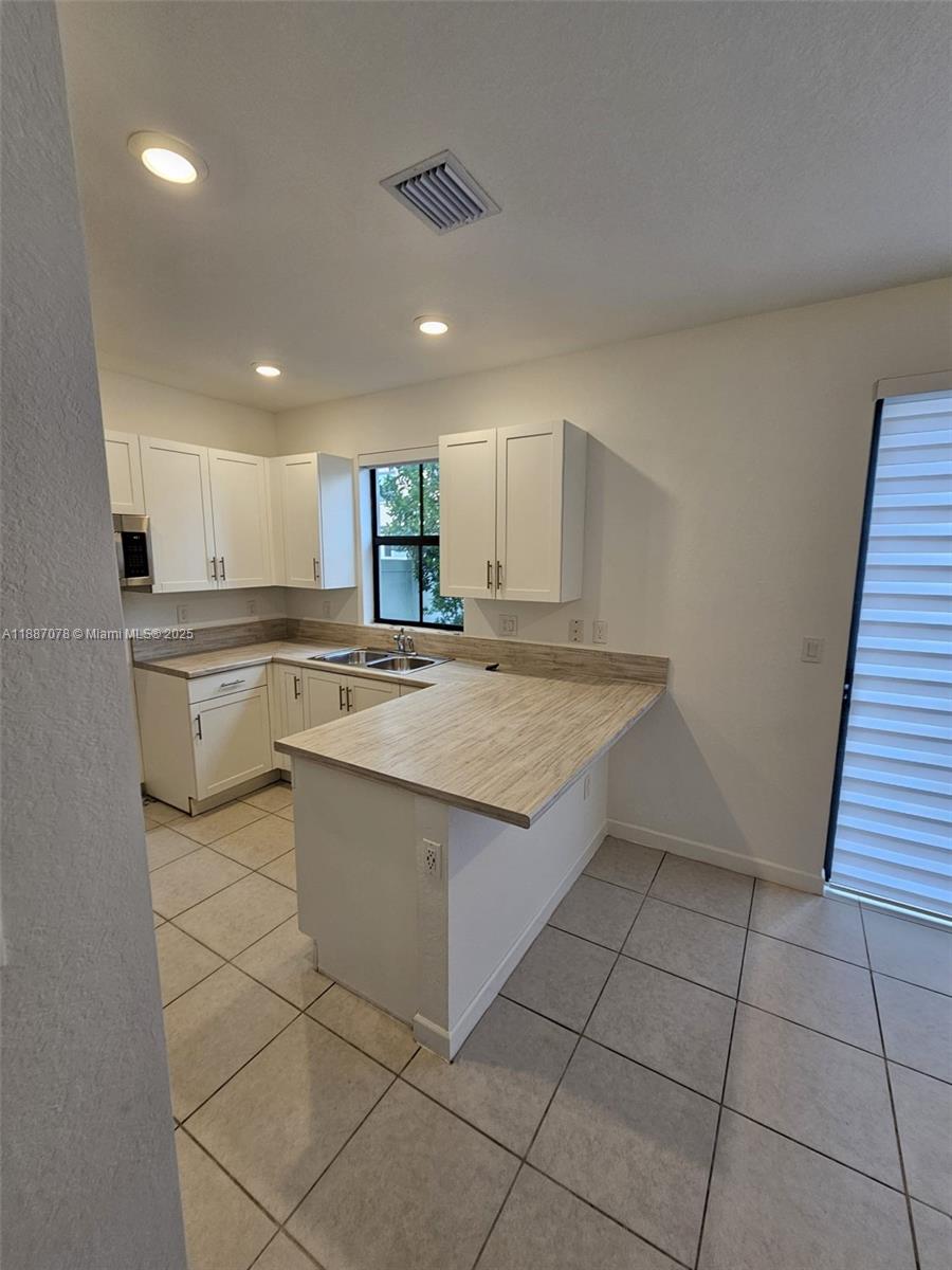 AQUABELLA NORTH REPLAT - Residential Lease