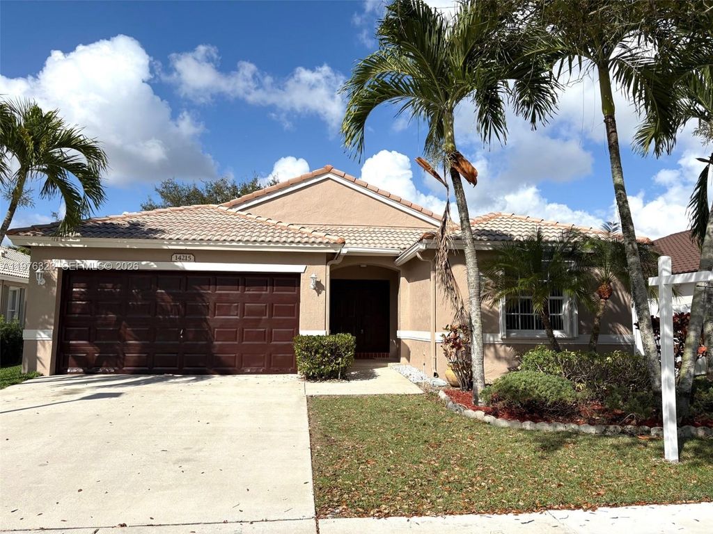Photo of 14215 NW 21st St, Pembroke Pines, FL 33028 (MLS # A11976323)