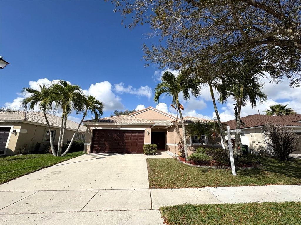 Photo of 14215 NW 21st St, Pembroke Pines, FL 33028 (MLS # A11976323)