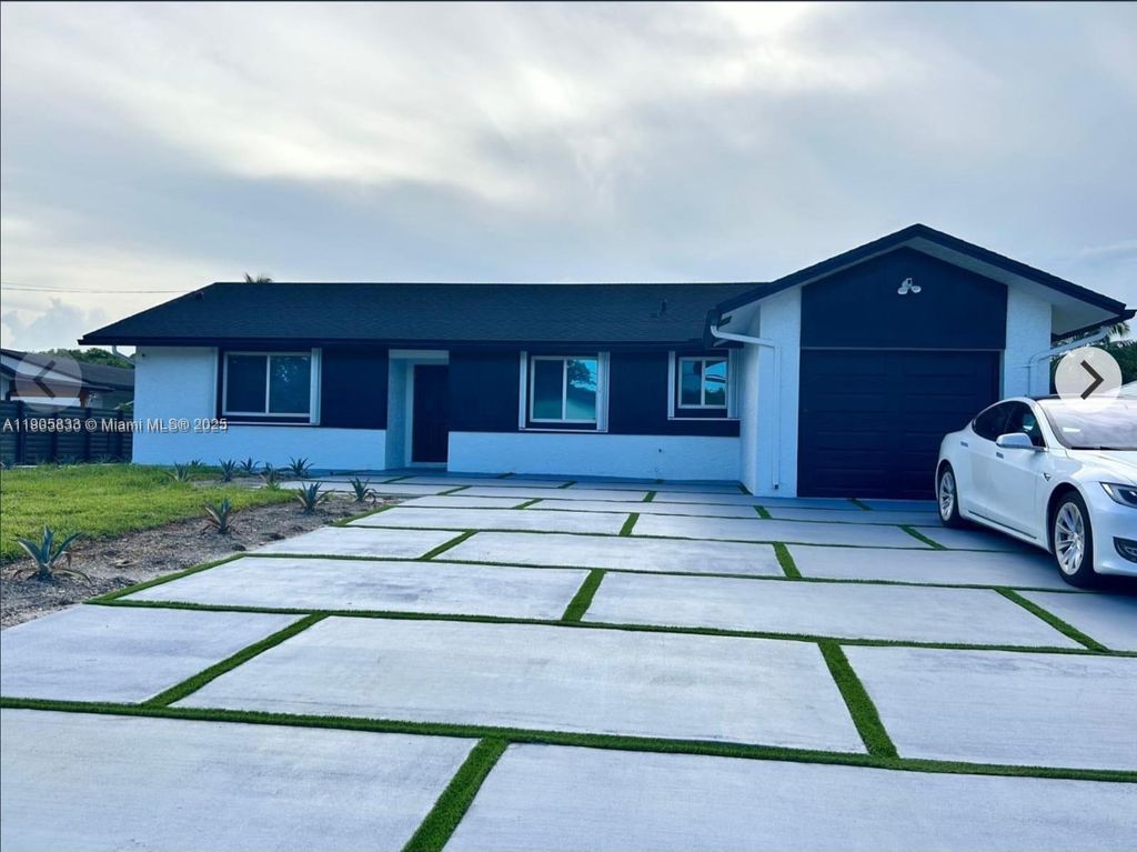 Photo of 4521 SW 55th Ave, Davie, FL 33314 (MLS # A11905833)