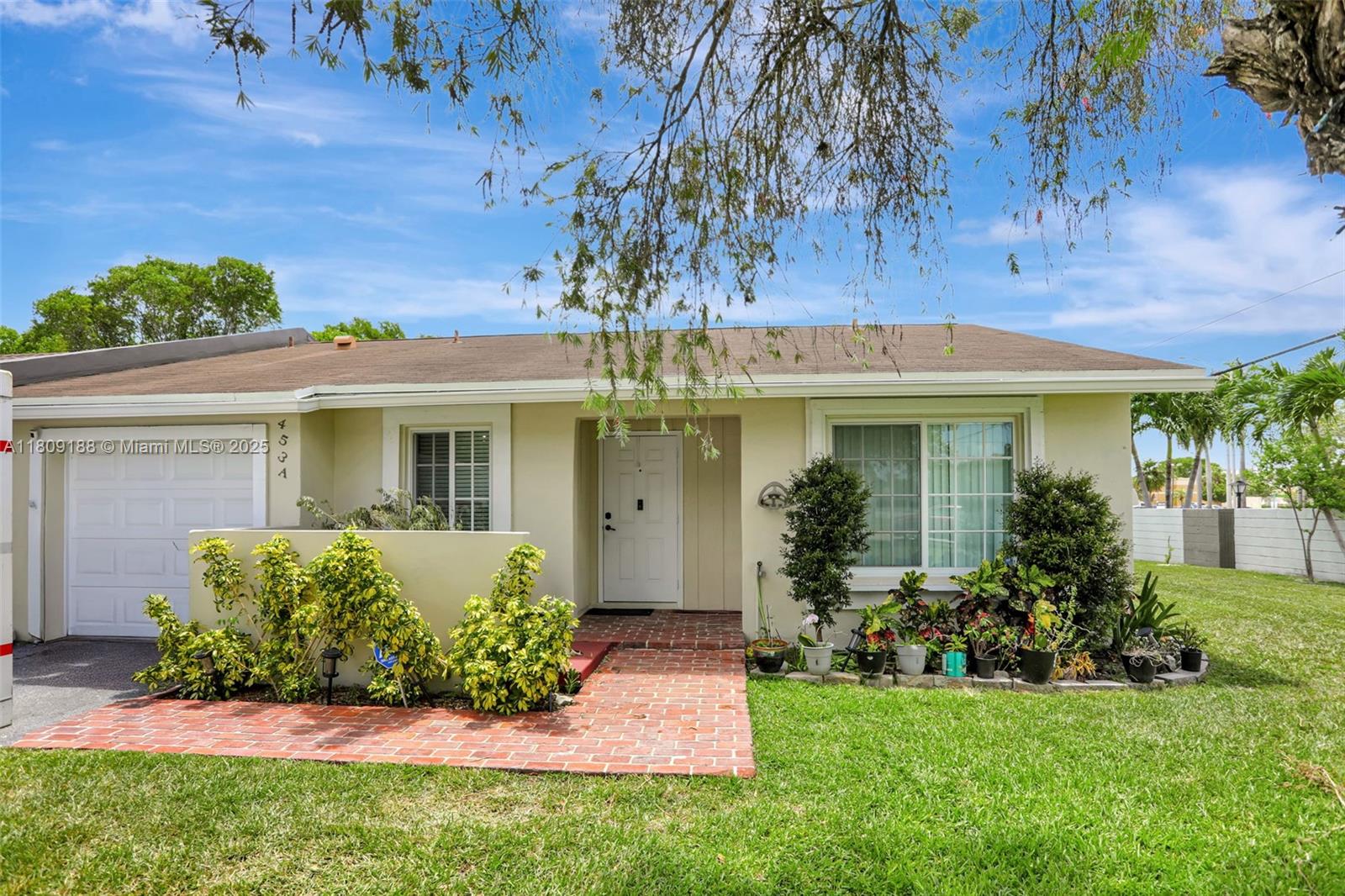 Welcome home to this beautiful remodeled 2/2 villa, priced at such a DEAL and is PACKED with upgrades & unmatched charm! You do not want to sleep on this one! Featuring a permitted living room extension offering a comfortable larger footprint, FULL impact windows-so quiet you’ll forget the world outside, 2022 3-ton A/C, 2021 water heater, owned solar panels paid off by Seller, Seller's FPL bills are as low as $30-$80, reverse osmosis system & whole-home filtration, updated kitchen with new appliances, new gutters, updated siding, gorgeous guest bath & more! Enjoy being situated on the end of the building and the extra communal yard space. New vinyl fence offers privacy and great outdoor space with shed for storage! HOA includes fiber optic cable + internet! Rent after 1 year, Pet Friendly!