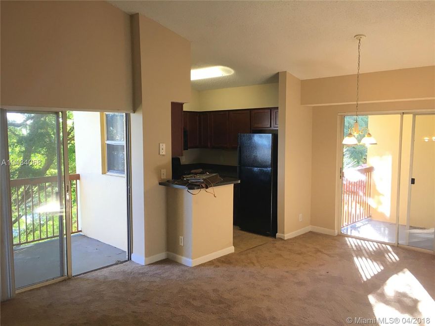 BEAUTIFUL WATER VIEW FROM 2 BALCONIES OVERLOOKING THE CANAL AND THE EVERGREEN LANDSCAPE IN THE HEART OF TAMARAC. THIS BRIGHT LARGE 2 BEDROOM 2 BATHROOM HOME FEATURES VAULTED CEILING GIVING AN EVEN LARGER FEEL TO THE KITCHEN, LIVING  AND DINING AREA. IT HAS NEW CARPET, UPDATED BATHROOMS, PLENTY OF CLOSET AND STORAGE SPACE, AND  WATER VIEW FROM EVERY SINGLE ROOM. 
BRAND NEW WASHER DRYER AND ELECTRIC RANGE ARE BEING INSTALLED THIS WEEK.
THE COMMUNITY IS VERY WELL MAINTAINED, QUITE AND  OFFERS MANY AMENITIES  FOR RESIDENTS TO ENJOY SUCH AS CLUB HOUSE, GYM, POOL, TENNIS COURT, WALKING/JOGGING PATH AND MORE.