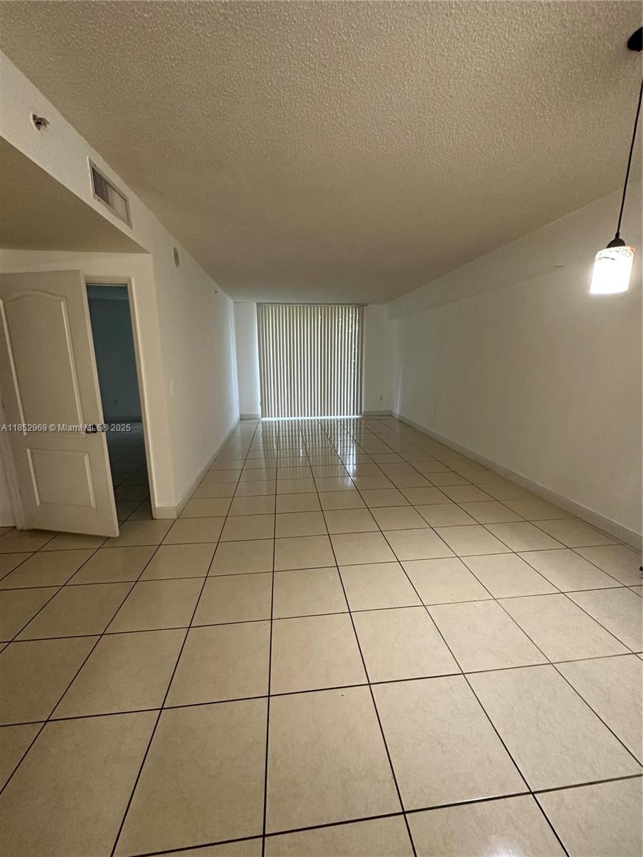 Spacious apartment 1038 sq ft with 2 bedroom, 1 bathroom and 1 assigned covered parking space, with beautiful view to city light, Blue Lagoon and Airport. Washer and Dryer inside the unit. The Blue Lagoon Condominiums has excellent location, gated community with 24/7 security and spectacular amenities that include business center, heated pool, Jacuzzi, fitness center, grocery, spa/sauna, beauty salon, 7 BBQ in front of the lagoon, mini golf, kids play area, area for parties, Electric vehicle (EV) charging Station. It is conveniently located in Central Miami, close to Miami International Airport and highway access to Downtown and the beaches in minutes.