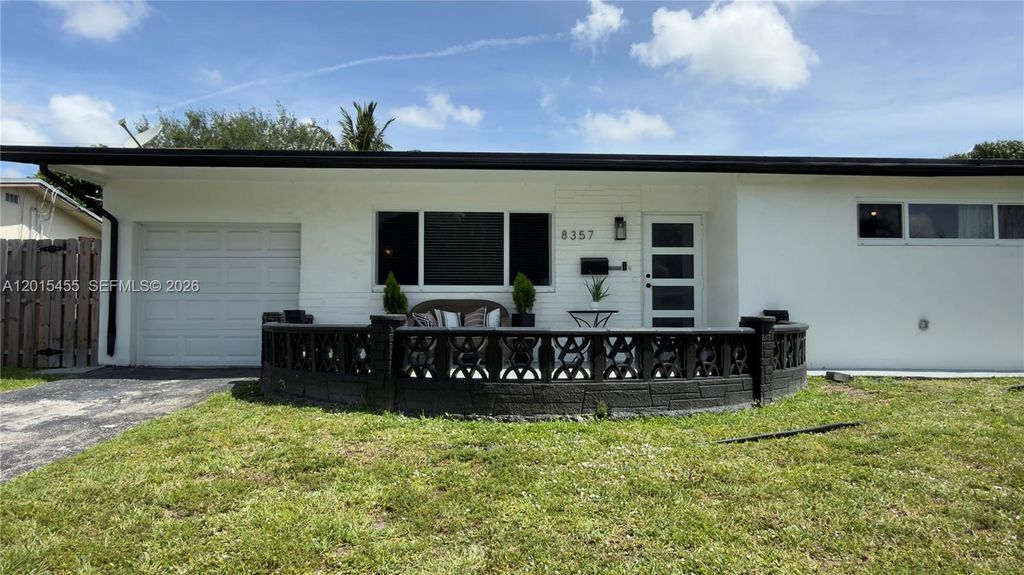Photo of 8357 NW 25th Ct, Sunrise, FL 33322 (MLS # A12015455)