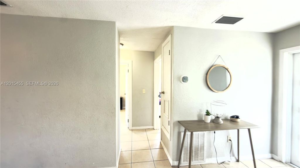 Photo of 8357 NW 25th Ct, Sunrise, FL 33322 (MLS # A12015455)