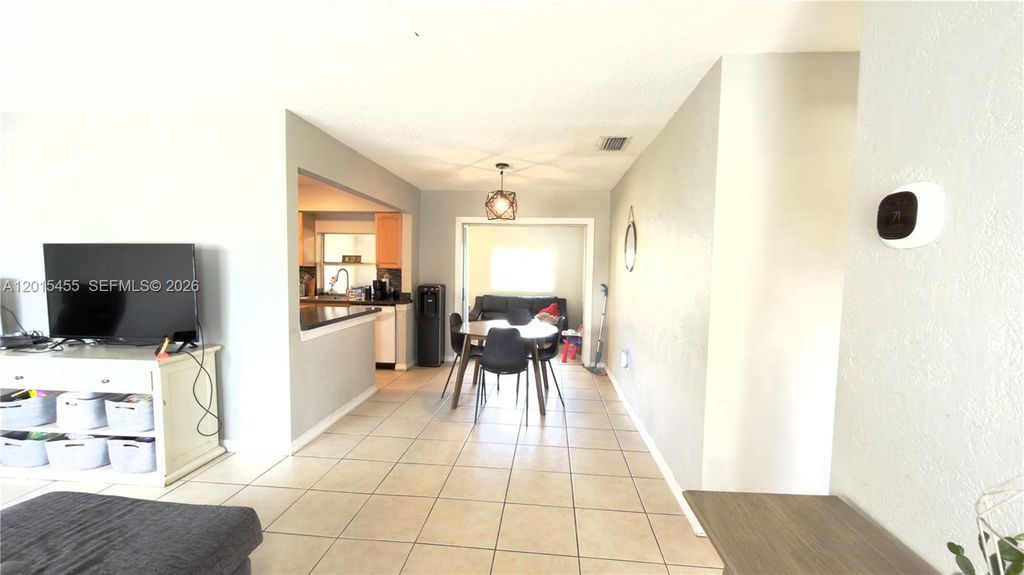 Photo of 8357 NW 25th Ct, Sunrise, FL 33322 (MLS # A12015455)