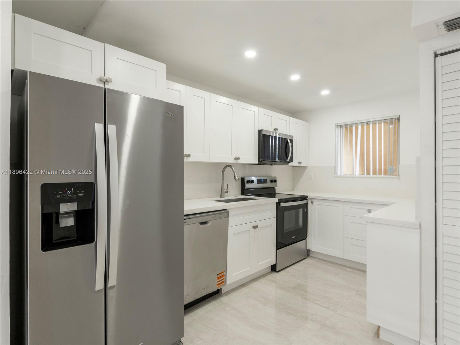 Step into this stunningly renovated 2-bedroom, 2-bathroom condo located in the highly sought-after Foxcroft community in Miramar. This modern residence boasts a brand-new contemporary kitchen featuring sleek quartz countertops, stainless steel appliances, soft-close white shaker cabinets, and recessed lighting that brightens the entire space. Enjoy the open-concept layout with luxurious porcelain tile floors throughout, offering both elegance and durability. The spacious bedrooms provide ample closet space, while both bathrooms have been tastefully updated with modern fixtures, vanities, and tile work for a clean, fresh look. The unit is located in a quiet and well-maintained building with secure entry, and comes with assigned parking.
Perfect for first time home buyers or investors!