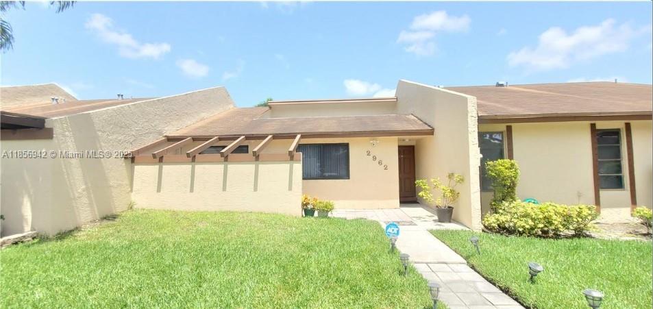 Beautifully updated 2BR/1BA lakefront villa in the heart of Sunrise! This bright, open home features vaulted ceilings, clerestory windows, and sliding glass doors that fill the space with natural light and showcase serene lake views. Spacious living/dining area flows to a private patio—perfect for relaxing. Well-appointed kitchen with full appliance package plus in-unit laundry. Two assigned parking spaces, impact windows, and solid block construction for peace of mind. Conveniently located near Sawgrass Mills, dining, parks, and major highways. Move-in ready—don’t miss this lakefront rental!