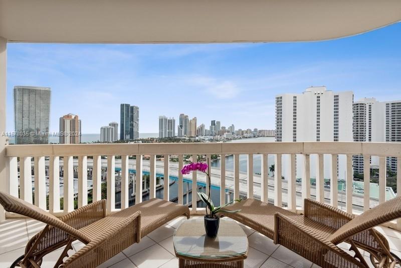 Upon entering through grand double doors, this expansive 3,400 sq. ft. home captivates with its open layout, seamlessly flowing from the family room to the formal dining space, all adorned with fine details. The wrap-around balcony offers breathtaking city-to-ocean views, perfect for any occasion. A chef's kitchen boasts top-of-the-line appliances, abundant counter space, and a charming kitchenette with panoramic vistas. The split layout includes three spacious bedrooms, each with en-suite baths, ensuring ultimate privacy. The luxurious 1,000 sq. ft. master suite features dual walk-in closets, a lavish bath, and a private balcony.