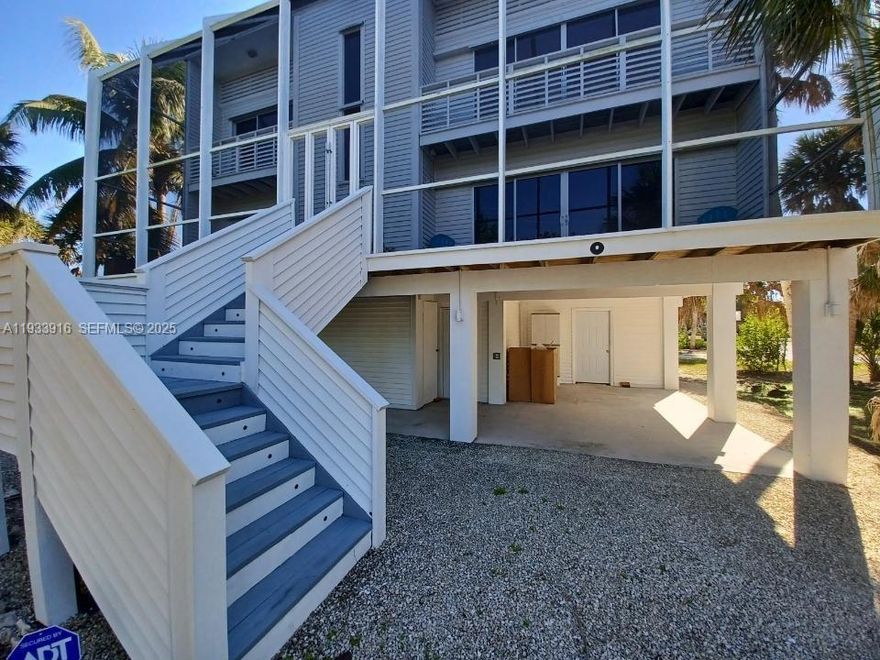 2 STORY, COMPLETELY REDONE PROPERTY IN SANIBEL, FL. MINUTES TO BEACHES, SHOPS, RESTAURANTS, AND BOATING VENUES. NO OWNERS ASSOCIATION. PROPERTY CAN BE RENTED WITHOUT RESTRICTIONS FOR EXTENDED RENTALS OR AIRBNB. 2 COVERED STORAGE/PARKING AREAS ON THE FIRST FLOOR, WITH 2 STORY STRUCTURE ABOVE IT. DOORS FULLY OPEN TO ENJOY A 2 STORY SCREENED IN AREA WITH FULL DECK. NEW KITCHEN, BATHS, AND FLOORING COMPLIMENT THE BRIGHT AND AIRY FEELING OF THE HOME.