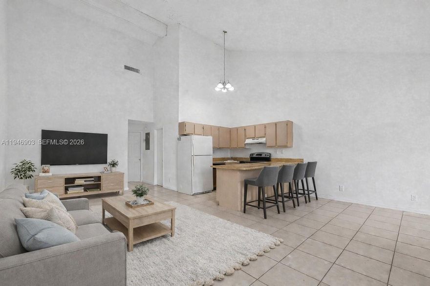 Charming 2-bedroom, 1-bath home located in the heart of Lauderhill, FL. This residence features a bright open layout that feels welcoming and functional—perfect for relaxing or entertaining. Enjoy your morning coffee on the open porch, plus the convenience of 2 dedicated parking spaces. Washer and dryer in the unit for added ease. Situated in a quiet, well-established neighborhood close to shopping, dining, schools, and major roads. FHA & VA welcome—an affordable opportunity to own for under $200K!