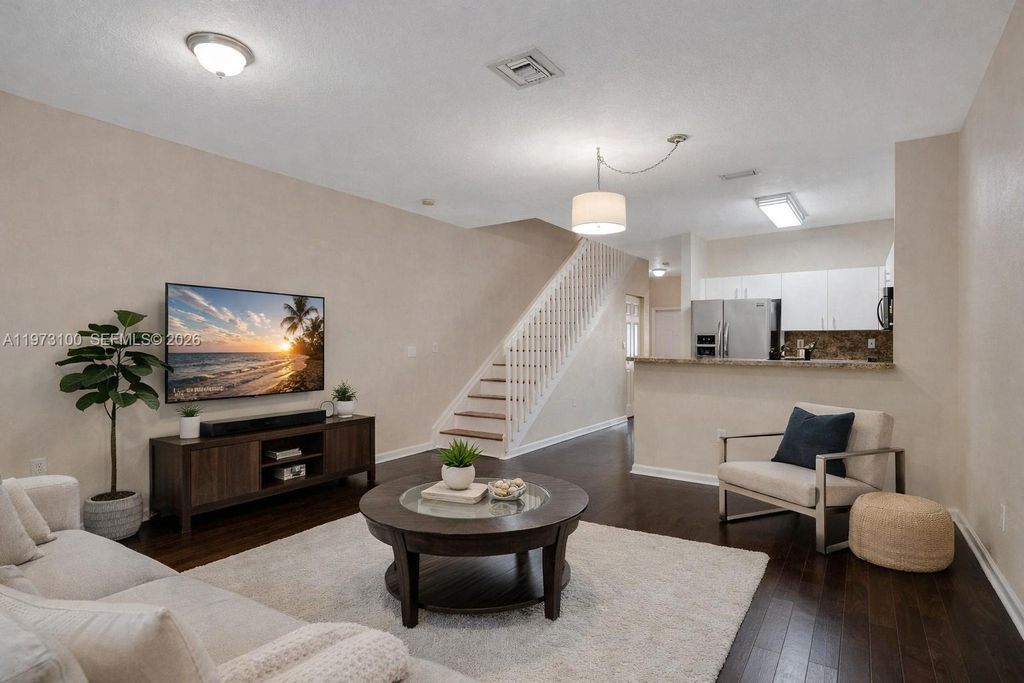 Photo of 4403 Woodland Cir, Tamarac, FL 33319 (MLS # A11973100)