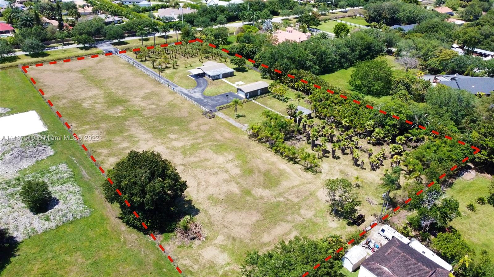 *BUILD TWO CUSTOM HOMES* PRIME LOCATION in prestigious Southwest Ranches, FL
Appx 5 acres, build your dream home with a horse stable.
Located 20 minutes to Ft. lauderdale and 40 minutes to
Miami or West Palm Beach. A 3 bedroom, 2 bath, with
detached garage and guest apartment with 1 bedroom,
1 bath. Includes palm tree nursery with barn. New roof,
property fenced for horses. Live and enjoy a country setting
yet in the city. ATTENTION BUILDERS, this property may be
divided for two large custom homes with Yard space for everyone!
New custom homes being built nearby priced $6 to $12 million.