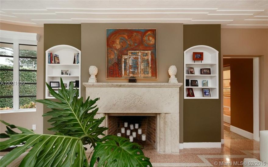 AMAZING 2 BEDRM 2.5 BATH HOME; MORE THAN 2,000 SQ. FT. OF LIVING SPACE.  BUILT IN 1941; MANY ORIGINAL DECO DETAILS.  STUNNING TERRAZZO FLOORS, ROUNDED WALL OF WINDOWS IN LIVING ROOM, ORIGINAL FIREPLACE.  WOOD FLOORS IN BEDROOMS & SLATE IN KITCHEN.  FORMAL DINING ROOM, FAMILY ROOM/CONVERTIBLE 3RD BEDRM.  RENOVATED KITCHEN WITH ISLAND & BREAKFAST ROOM/OFFICE.  MASTER BATHROOM & POWDER ROOM  RENOVATED, 2ND BEDRM HAS BEAUTIFUL ART DECO ORIGINAL BATHROOM.  BOTH BEDROOMS HAVE ACCESS TO THE YARD. ROOM FOR POOL.