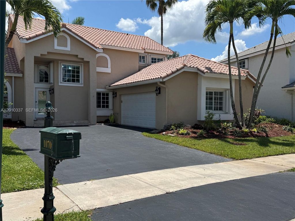 Photo of 1070 Capistrano, Weston, FL 33326 (MLS # A12010337)