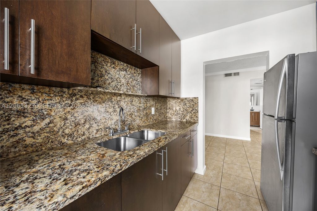 Photo of 5420 Hollywood Blvd #202, Hollywood, FL 33021 (MLS # A12061327)