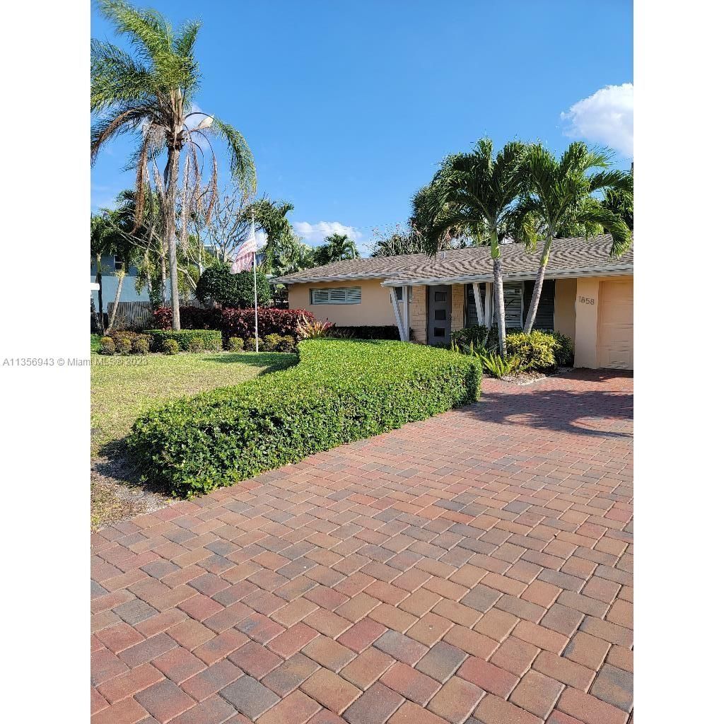 Photo of 1858 NE 34th St, Oakland Park, FL 33306 (MLS # A11356943)