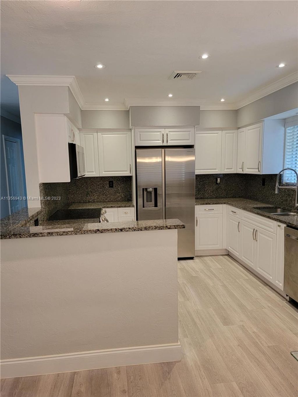 Photo of 1858 NE 34th St, Oakland Park, FL 33306 (MLS # A11356943)