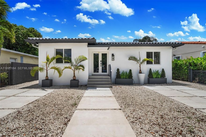 Beautifully renovated modern home in the heart of Miami offering 4 bedrooms and 3.5 bathrooms, including a private detached guest suite. The separate suite provides the perfect space for extended family, guests, a home office, or the opportunity to generate additional rental income. The main residence features bright open living areas, a sleek contemporary kitchen with custom cabinetry and stainless steel appliances, spa-inspired bathrooms, and a spacious walk-in closet. Enjoy a large covered terrace overlooking a generous backyard ideal for entertaining or relaxing. Gated front entry provides privacy and curb appeal. Prime location just minutes from Brickell, Downtown Miami, Coral Gables, and major highways, offering the perfect blend of comfort, style, and convenience.
