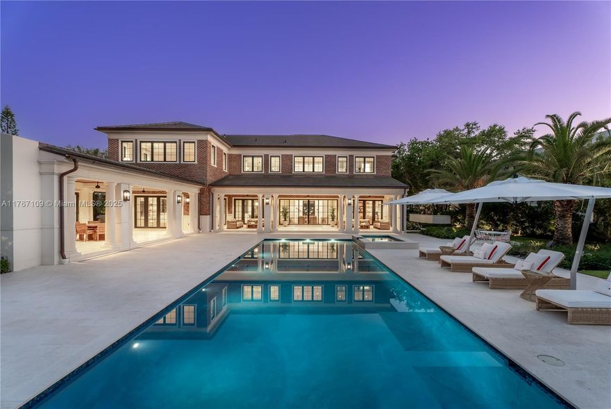 Literally the best custom home EVER built in Pinecrest! A sprawling estates of Connecticut inspired transitional Georgian Architecture. Spanning over 9,878 total square feet, this 2023 masterpiece offers 7 bedrooms, 8.5 baths, and a level of craftsmanship very rarely seen. Designed for one who will not compromise on anything but exceptional quality. Architectural features include precast columns, crowns, trims, moldings & a unique red brick facade. Nestled on nearly an acre, this home boasts high ceilings, custom millwork, rare marble walls, designer wallpapers & hardwood floors. A gourmet chef’s kitchen features a Bertazzoni range, Gaggenau fridge/freezer, and steam oven. Outdoor entertainment includes a summer kitchen, sauna, and a heated saltwater pool with a jacuzzi.
