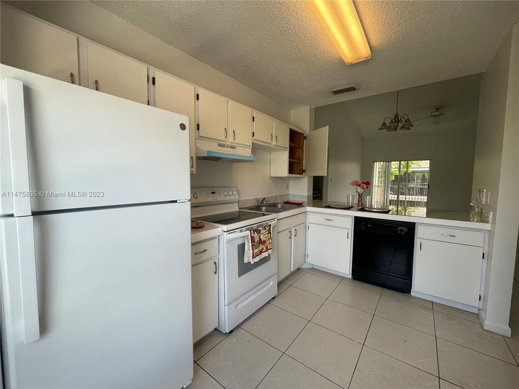 Photo of 8002 SW 21st Ct #8002, Miramar, FL 33025 (MLS # A11475835)