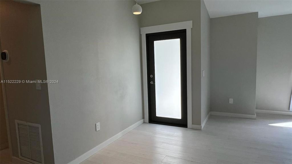 Photo of 5060 NW Erskin Terrace, Saint Lucie Village, FL 34983 (MLS # A11522229)