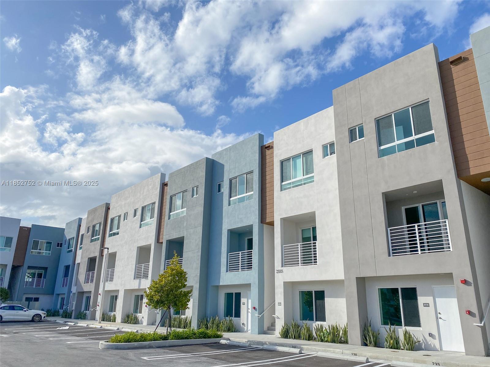 Second floor 2 bedroom + Den townhome, the only one in the community featuring 2 assigned parking spaces located in front of the unit. This residence offers an open concept layout. On the main floor, you'll find a spacious kitchen with a generous breakfast bar, modern cabinetry and top of the line appliances. Split living and dining areas and a charming balcony. A powder room completes the main level. Upstairs you'll find two bedrooms and a versatile den. The master suite boasts a walk-in closet, a linen closet and a modern en-suite bathroom. The second bedroom also features a walk-in closet and a full bathroom. Amenities: pool, BBQ, pet zone, green area, gated community. Great location, easy access to I95, Biscayne Blvd, Brightline, Aventura Mall and beaches.