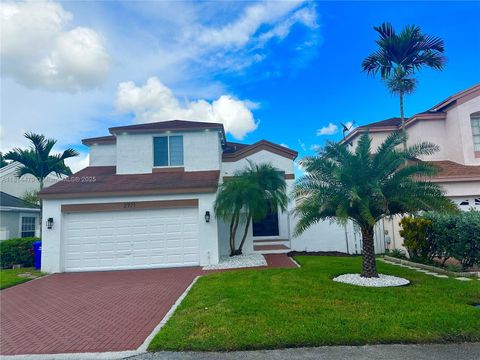 Photo of 2771 W River Run Cir W, Miramar, FL 33025 (MLS # A11814479)