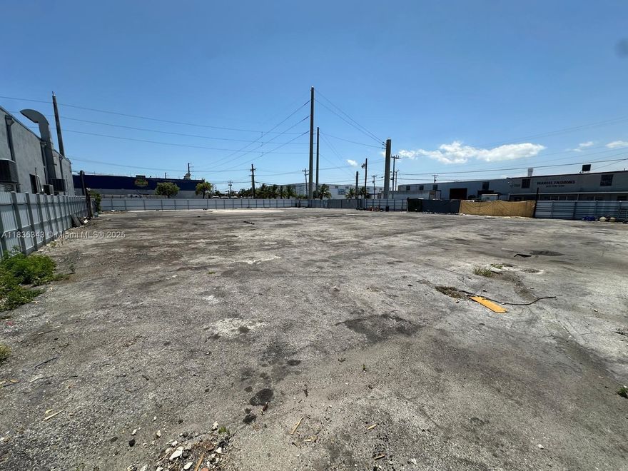 Exceptional opportunity to own a high-visibility commercial lot located on a prominent corner along a busy main street. This fully paved and securely fenced parcel offers immediate functionality for a wide range of uses such as vehicle or boat storage, equipment parking, and future development. Current Use Code is 110-Sales and Services including wholesale facilities, spot commercial, strip commercial, neighborhood shopping centers/plazas. Situated in an area experiencing rapid growth and new construction, this property is perfectly positioned to benefit from increasing traffic and development activity. Boasting excellent frontage on two well-traveled roads, and the lot offers easy ingress and egress with excellent exposure for signage or business operations.