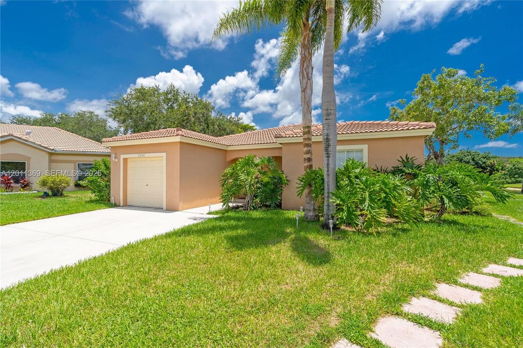 Photo of 2001 SW 104th Ave, Miramar, FL 33025 (MLS # A12011369)