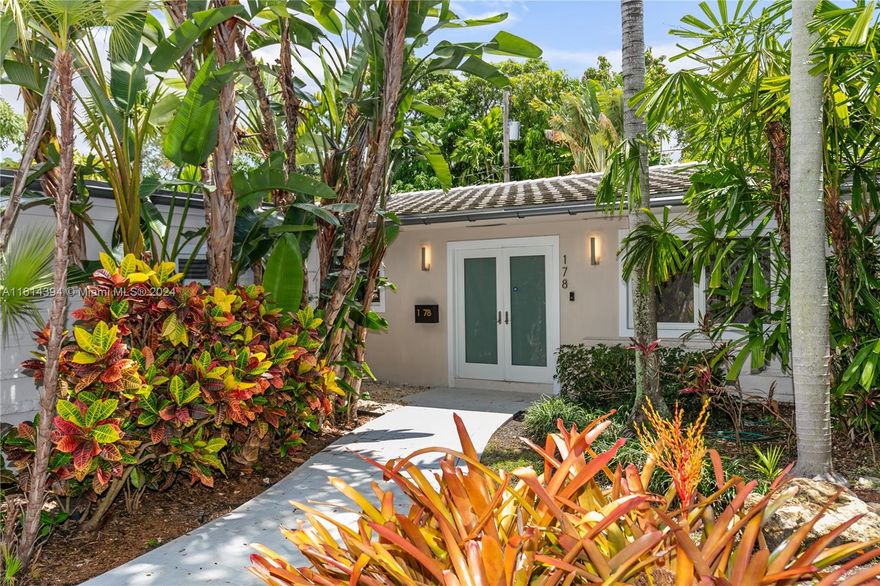 Located within the prestigious Bay Heights enclave, this extensively renovated residence embodies the essence of Miami living.This spacious & luminous home features 4 bedrooms & 3.5 baths, showcasing a rare blend of modernity & tropical charm. Renovations include a newer roof, impact glass windows, flooring, remodeled bathrooms, among other enhancements.The kitchen is equipped with Monogram appliances, including dual dishwashers, an induction stove, & Miele wine refrigerator.The expansive family room, accentuated by wood beam ceilings, seamlessly integrates with the open living & dining areas, offering picturesque views of the meticulously landscaped backyard and inviting pool. Security is assured with 24/7 police patrol, providing privacy & peace of mind in this exclusive community.
