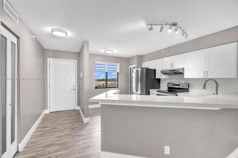 Photo of 2112 S Cypress Bend Dr #802, Pompano Beach, FL 33069 (MLS # A11862087)
