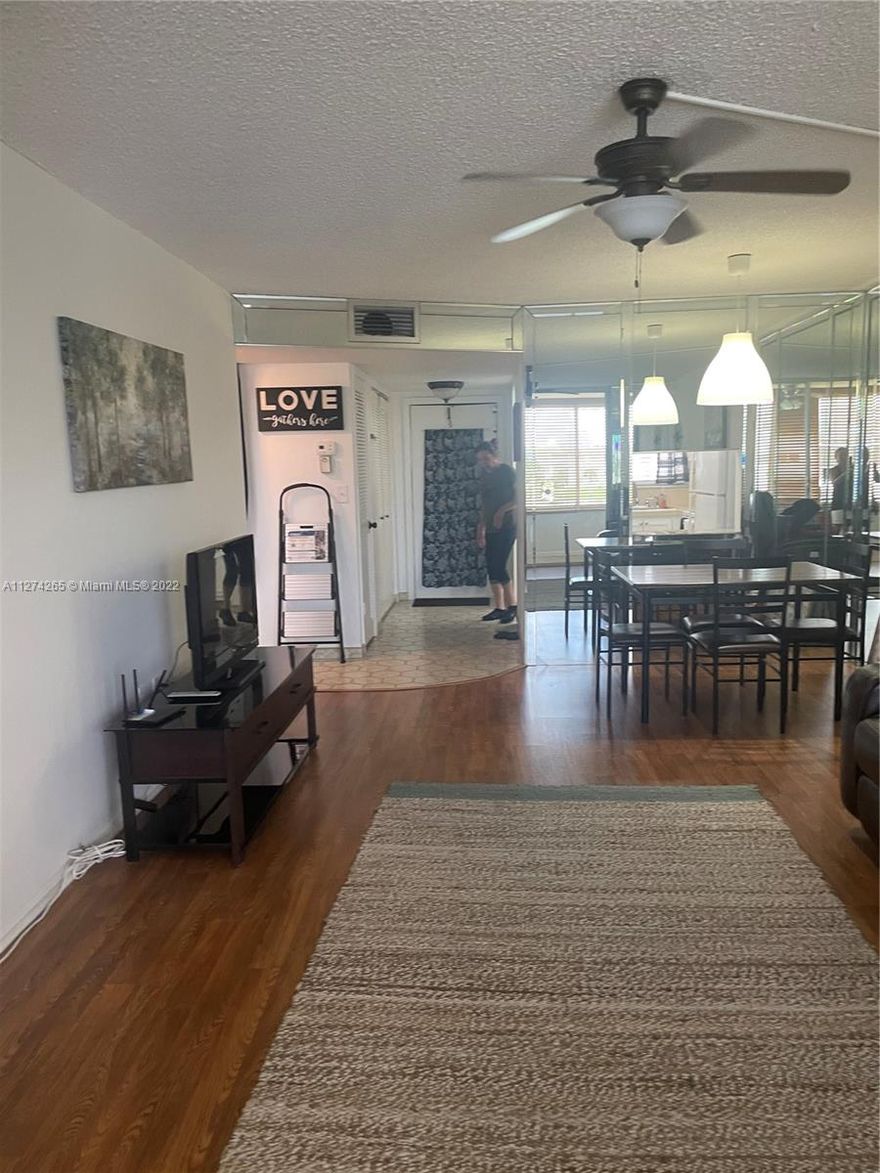 Great location ,Corner Unit ,Beautiful View, Partially renovated with laminate floors, tile work in kitchen and
bathrooms and splendid view! Newer appliances, windows and a/c. This community is close to shopping, restaurants  and has public transportation. Three pools, a gym and activities make this one of the nicest places to live in Broward! EQUAL HOUSING OPPORTUNITY