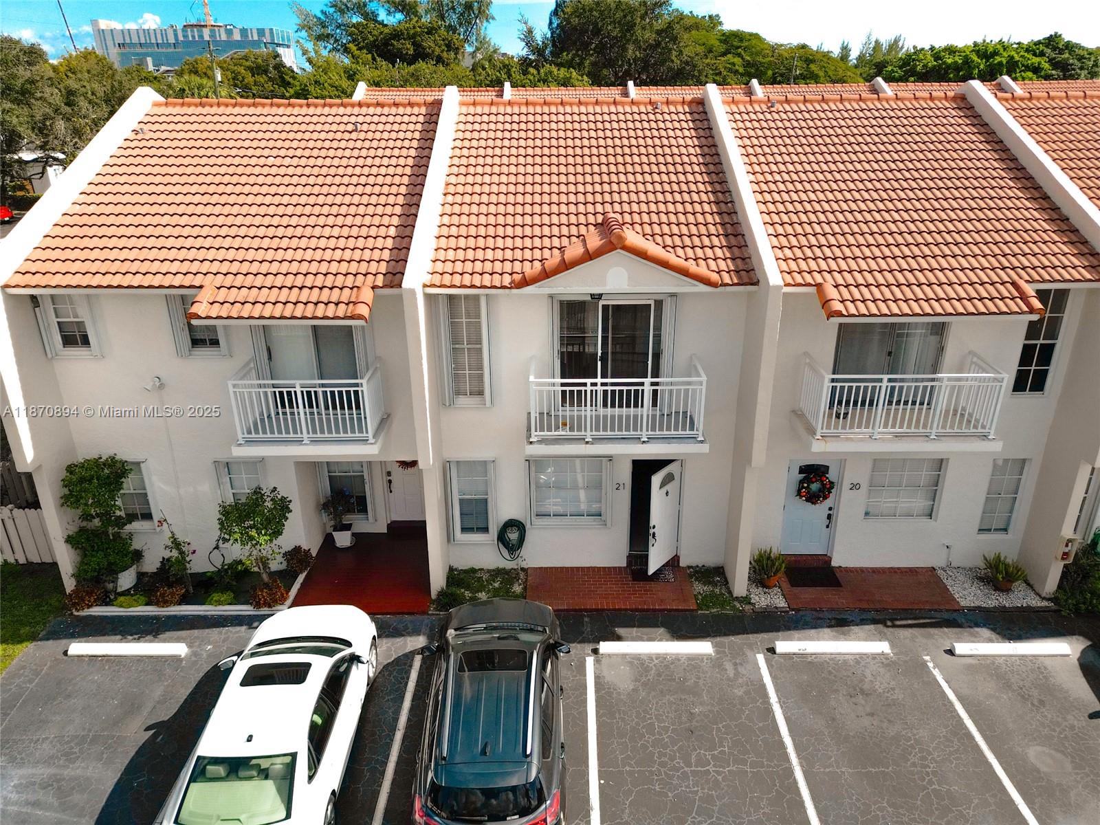 Modern 2-level, 2-bedroom, 2.5-bath townhouse with 1,200 sq. ft. of living space in a secure, gated community in the Biscayne area, just off US-1. The townhouse features tile and laminate flooring throughout, spacious bedrooms with large closets, each with its own balcony and full en-suite bathroom. Unit features 2 assigned parking spaces in front of the property. Enjoy a charming backyard perfect for BBQs and entertaining. Conveniently located within 5 miles of Aventura Mall, Arch Creek Memorial Park, LA Fitness, the Shops at Bal Harbour, and FIU. Please note: No pets allowed as per HOA.