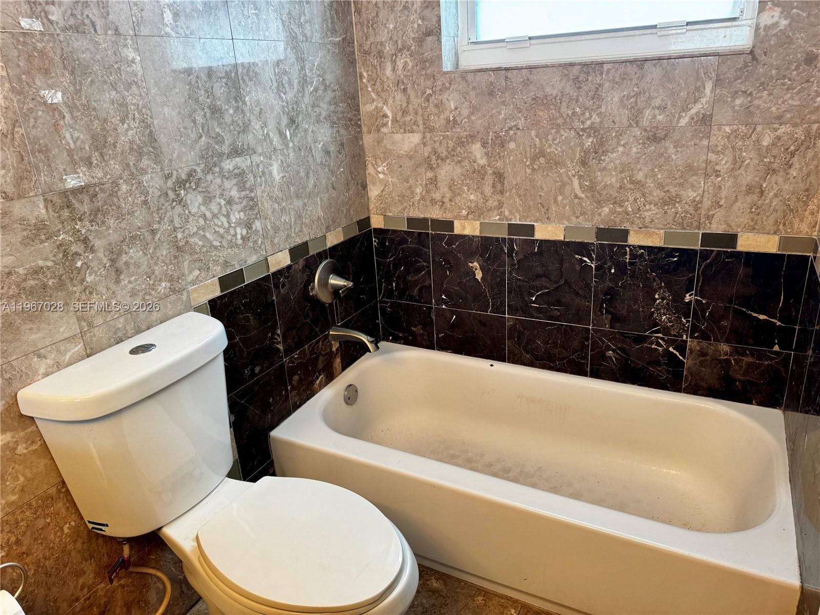 1245 WEST AVE CONDO - Residential Lease