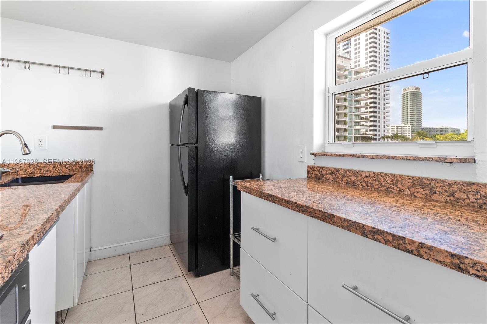 1245 WEST AVE CONDO - Residential Lease