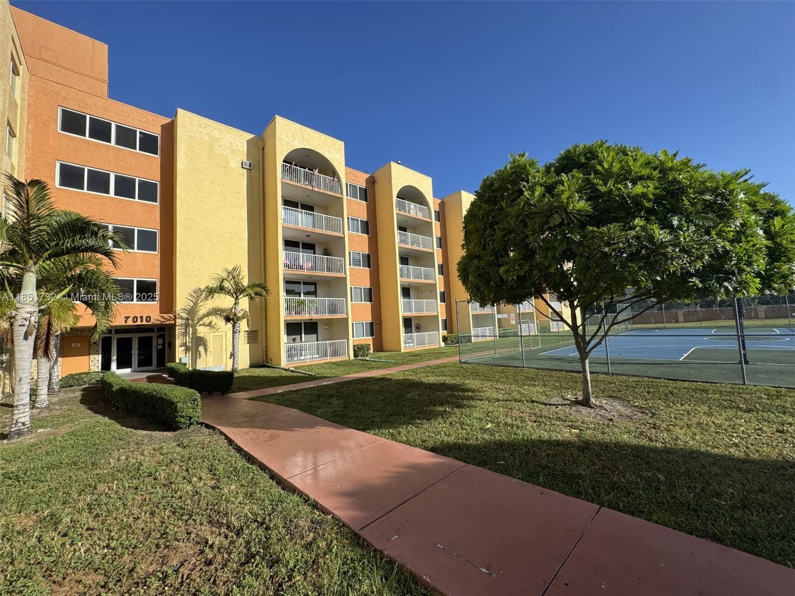 FIRST FLOOR - HUGE 1/1 - CORAL GATE WEST - MOVE IN READY. Features include an updated kitchen and bathroom, a spacious walk-in closet, and partially furnished. The community offers a security gate, pool, and basketball courts. Water included. Per Association- no pets, 650 min credit score, and 2 cars max.