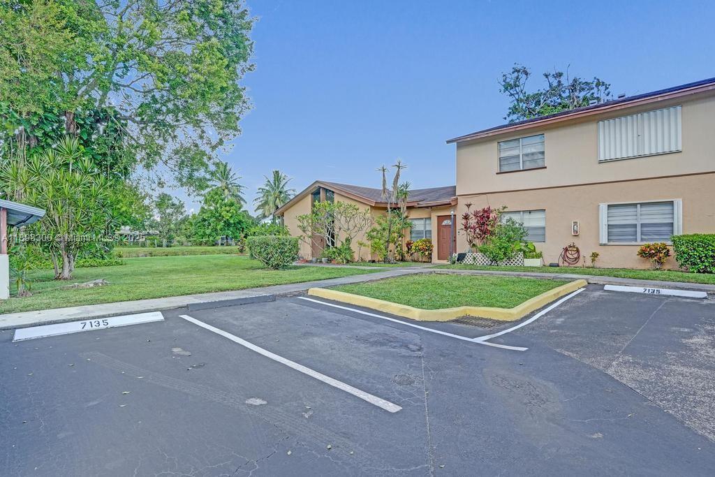 Beautiful PLANTATION corner lot unit! This spacious 2 BD | 2 BA home offers the ideal blend of comfort, privacy, and convenience in an all age community! Featuring tile floors throughout, vaulted ceilings & a bright ope layout with living and dining areas perfect for relaxing or entertaining. Enjoy in-unit washer and dryer, plus a newer HVAC and electrical panel peace of mind. This unit offers added privacy, while community amenities include a pool, tennis courts, and basketball court. Centrally located near top-rated schools, parks, shopping, dining, and major highways. A wonderful opportunity to live in one of Plantation’s most desirable areas — where comfort and convenience meet!