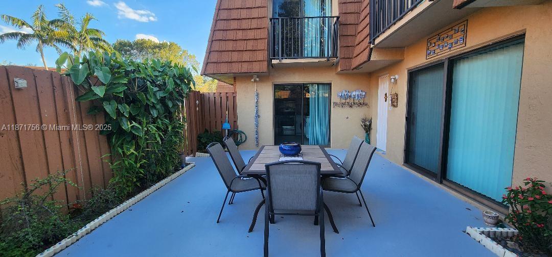 A great 2 Beds, 2.5 bath townhome in Rock Creek, the very desirable Cooper City! The kitchen has an Epoxy countertop (also in the bathrooms), SS appliances, washer & dryer machines, all from 4 years ago, and new tiles in the kitchen and bathrooms. Upstairs 2 big masters; big closets a full private bath, a laminate floor, and a little balcony in each room. Big size of the fenced patio, enjoy the family / BBQ or gardening. Impact sliding doors on the first floor. Walking distance to Camelot Gardens sub-pool and another big community pool for the rest of Rock Creek's neighbors. Rock Creek is a quiet and friendly family community that offers playgrounds, basketball and tennis courts, a gym, a clubhouse, and walking trails. The owner is a realtor, so please do not make marketing calls.
