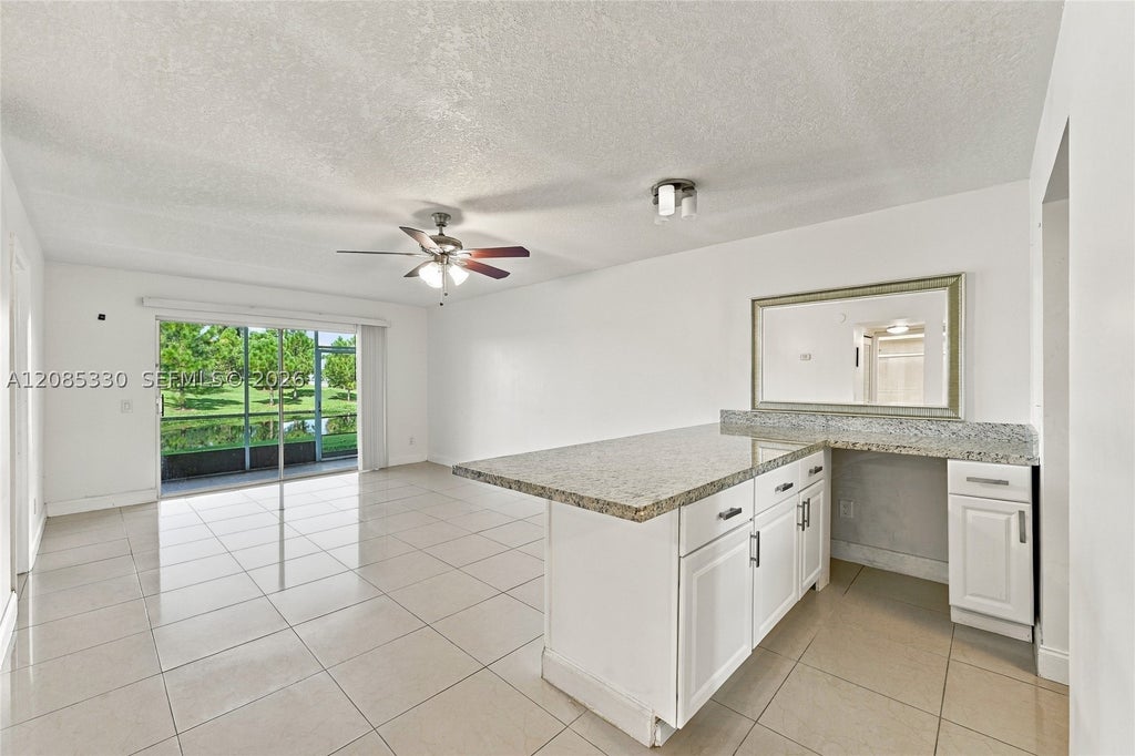 Photo of 2431 SW 82nd Ave #103, Davie, FL 33324 (MLS # A12085330)
