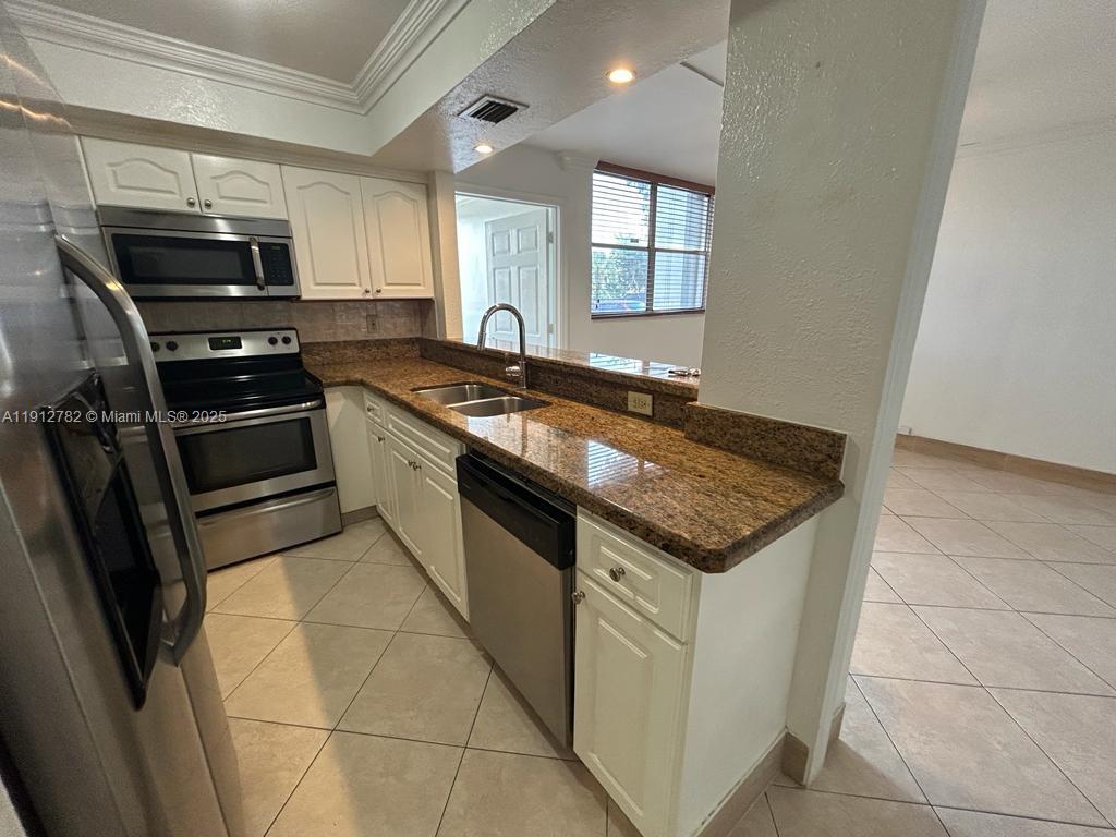 VERSAILLE GARDENS I CONDO - Residential Lease