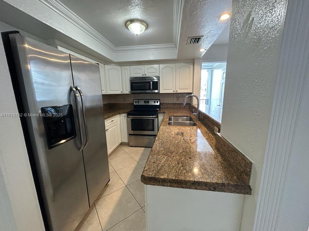 VERSAILLE GARDENS I CONDO - Residential Lease