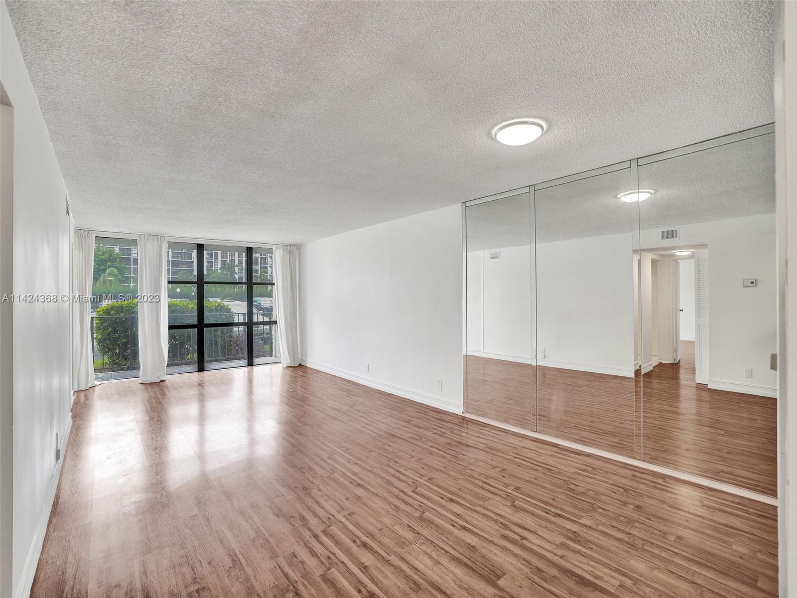 Light-filled and spacious 2 Bed / 2 full Bath unit in a quiet intracoastal pocket of Hallandale Beach. Freshly painted with large rooms, lots of closets and a HUGE primary WALK-IN CLOSET. 1 Assigned Parking spot and Guest Parking. LAUNDRY Room on every floor. Storage unit included. Secured lobby with key card access and front desk. Amenities include Basketball and Tennis Courts, two GYMS, POOL overlooking the Intracoastal, Sauna, BBQs, and a Community Room with ping pong, kitchen, and pool table. 10 min to Aventura Mall and Hollywood Beach! NO PETS. Minimum credit score: 700 REQUIREMENTS: proof of income 3X rent, copy of ID, background check, First month, 2 months security deposit, $750 building deposit. Water included in rent.